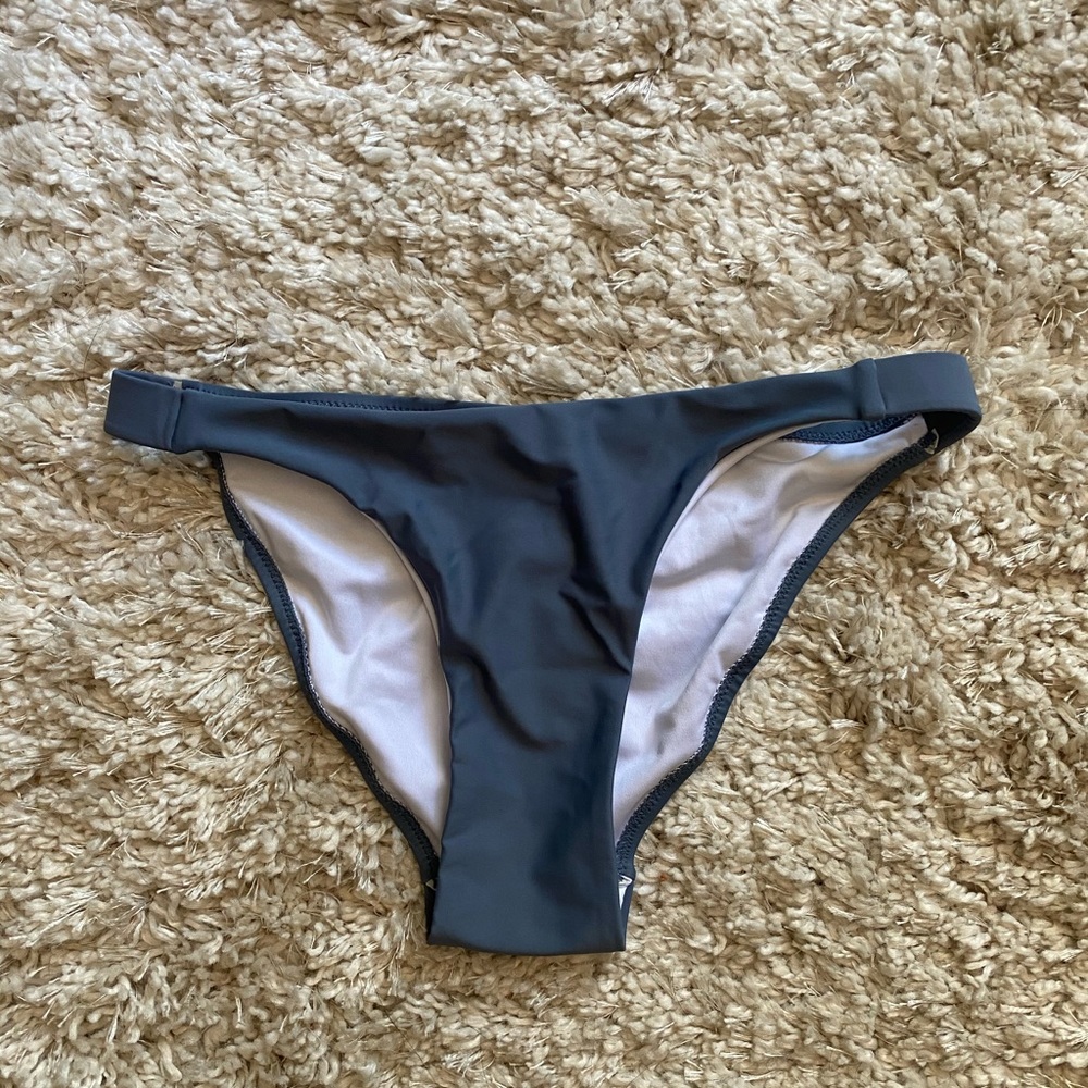 Dusty blue cheeky bikini bottoms.